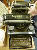 Old Imperial and Underwood typewriters and a portable typewriter