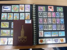 Collection of Olympic stamps in a vintage Olympic album and an album of stamps relating to sport