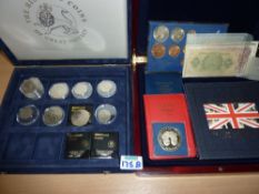 Collection of Brilliant uncirculated coins including four £5 pieces, sets and paper money in two