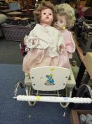 Silver Cross doll's pram, wooden crib and three dolls