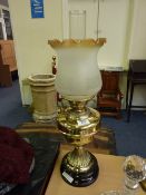 Victorian brass oil lamp on black ceramic base