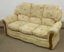 Three piece lounge suite in beige patterned chenille cover with wood arm fascias