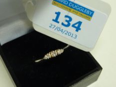 Three stone platinum set diamond ring stamped 18ct plat