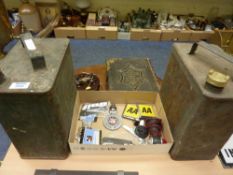 Two old petrol cans 'Pratts' & 'BP' and a collection of car badges etc