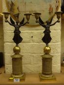 Pair of Regency period two branch candlesticks in the form of bronze winged female figures 45cm