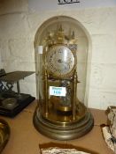 Early 20th Century brass 400 day clock under glass dome