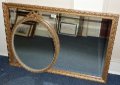 Rectangular bevelled edge wall mirror in gilt frame and an oval mirror