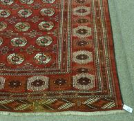 'Turkman' hand made red ground rug, 263cmx 210cm