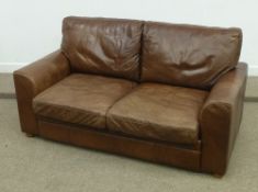 Pair two seat settees in antique brown distressed leather