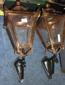 Pair of Victorian style copper wall lights on metal wall brackets