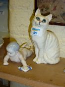 Royal Copenhagen figure of a baby and a Beswick cat