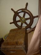 Ship's wheel and old pine box