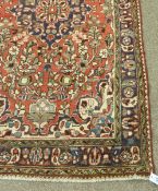 Persian 'Hamadan' hand made red ground rug, 190cm x 106cm