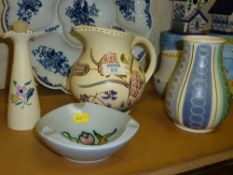 Three Poole Pottery vases, similar Honiton jug and Ghouda dish