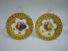 Pair of Royal Worcester plates painted with fruit and signed by A Shuke date code 1922 23cm