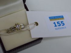 White and yellow hallmarked 18ct gold diamond solitaire ring