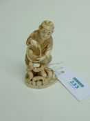 Early 20th Century Japanese carved ivory Okimono of a fisherman signed