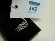Sapphire and diamond rope twist hallmarked 18ct gold ring