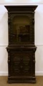 Victorian heavily carved oak bookcase on cupboard with frieze drawer, 82 x 208cm high