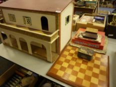 Doll's house, wooden chess board, old games, etc