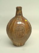 18th Century stoneware Bellarmine flagon moulded with bearded face mask and three Coats of Arms