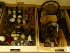 Carved wood figures, fishing reel, painted eggs and miscellanea in two boxes