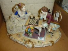 Continental porcelain group of The Chess Players 40cm
