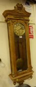 Late 19th Century walnut cased Vienna type triple weight driven wall clock, the engraved brass