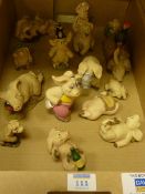 Collection of Piggin' resin sculptures in one box