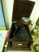 Early 20th Century cabinet type loud speaker and a 35mm camera