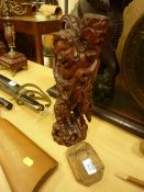 Oriental hardwood carved figure with dragon and a Mouseman oak ashtray by Thompson of Kilburn
