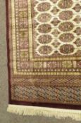 Beige ground Bokhara rug 170cm x 125cm