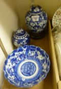 Two blue and white ginger jars with lids and a similar blue and white dish