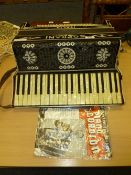 Soprani piano accordian with music book