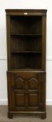 Medium oak floor standing corner cupboard with two shaped shelves by Pratts of Bradford