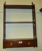 Small mahogany wall display shelf