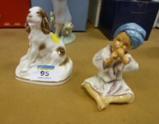 Two Royal Worcester figures 'India' modelled by F G Doughty and 'Springer Spaniel' modelled by