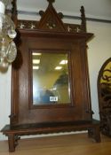 Oak framed hall mirror and a wrought iron mirrored shelf