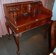 Georgian style reproduction mahogany writing desk, fitted with correspondence drawers