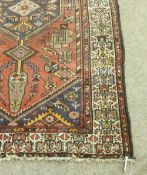 Persian Hamadan red ground hand made rug, 220cm x 133cm