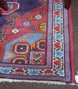 Persian Hamadan red ground hand made rug, 208cm x 130cm
