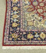 Persian Najafabad red ground hand made carpet, 317cm x 216cm