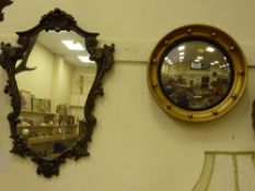 Convex wall mirror in gilt balled frame and another wall mirror