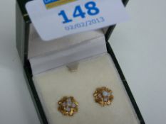Pair of opal ear-rings in flower setting stamped 9ct