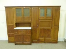 1930's vintage stained pine complete fitted kitchen in three sections, with enamel work surface,