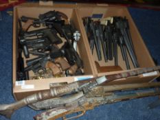 Collection of antique 'model' muskets, hand guns etc in two boxes