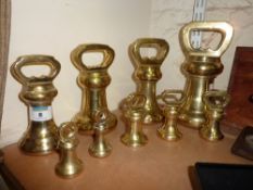 Set of solid brass butchers weights 14lb and graduating