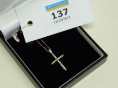 Platinum diamond cross pendant on chain stamped 750