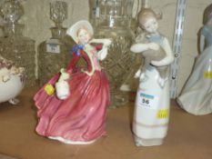 Royal Doulton figure 'Autumn Breezes' HN1934 and a Lladro figure girl with a lamb