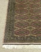 Handmade Bokhara rug plum ground with signature panel 164cm x 100cm